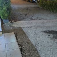 Arif Barbershop entrance and parking area